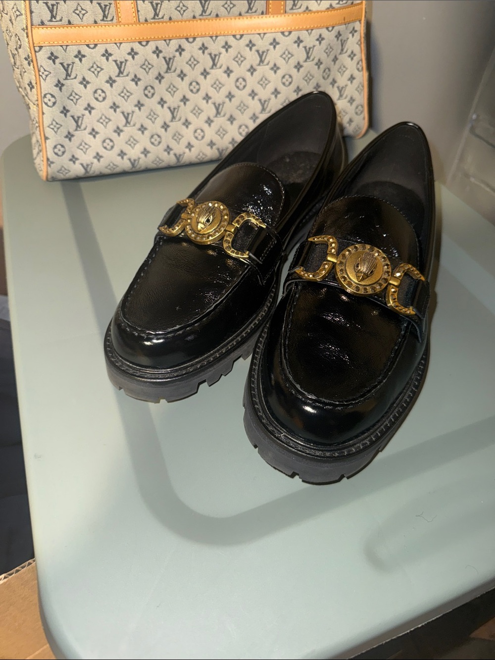 Kurt Geiger Black Patent Loafers with Gold Emblem